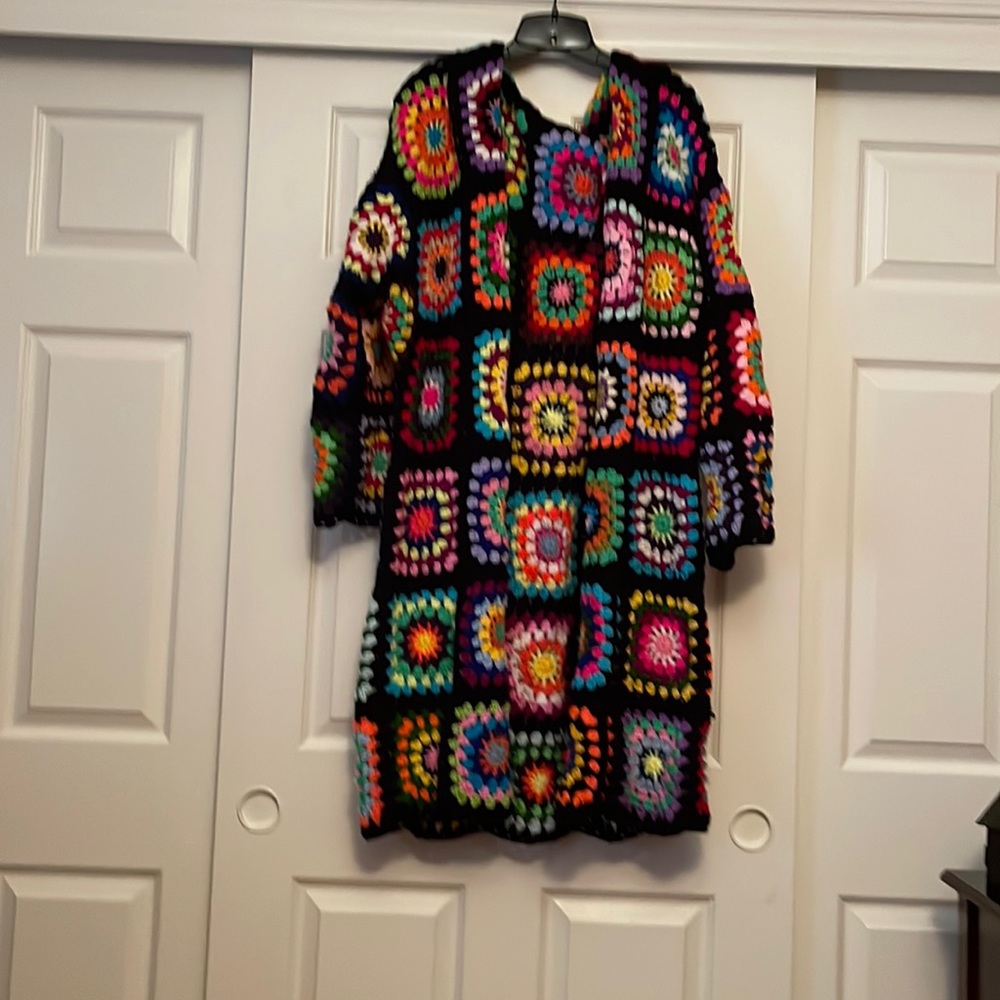Hand crocheted granny square cardigan new, and never worn